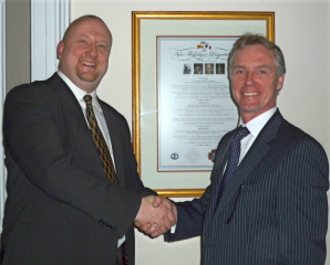 Robert Cooper (left) welcomes Tom McCann (right) to NW Hampshire